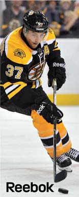 Boston Bruins Patrice Bergeron wearing Reebok hockey gear